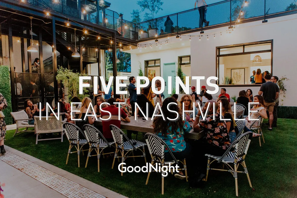 A lively exterior scene showcasing a bustling outdoor dining area with groups of people socializing under string lights, all set against modern architecture. The energy is high, and the mood is festive, capturing the spirit of East Nashville's nightlife and culinary scene.